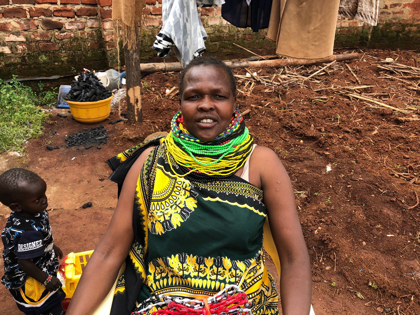 Dinah is pictured here. She is wearing traditional Turkana African clothing and beading.
