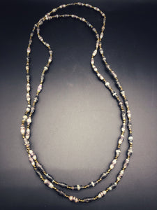 Hand crafted black and grey necklace with gold seed bead accent made from magazines. Each bead individually rolled by hand.  Stylish and Fashionable for casual or dressy. Fair trade. 