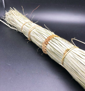 top view of one hand broom made from papyrus reed natural color