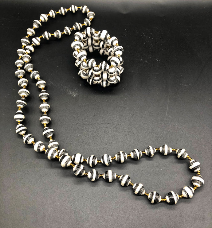 Hand crafted black and white medium length necklace and stretch bracelet set.  Approximately 18