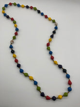 Load image into Gallery viewer, Hand made colorful medium length multicolor necklace made from magazines with accent seed beads in between. Each bead is hand rolled. Stylish and fashionable for casual or dressy. Fair trade.  Approximately 18&quot; L