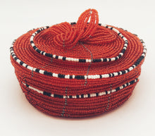 Load image into Gallery viewer, Fair Trade hand crafted basket made from seed beads. Round shape with lid. These baskets take 1 full day to create.  Red color