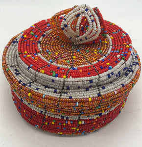 Fair Trade hand crafted basket made from seed beads. Round shape with lid. These baskets take 1 full day to create. 