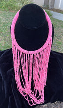Load image into Gallery viewer, Pink necklace hanging on bust. Chocker with long strands of pink beads hanging down and looping back to connect to choker.