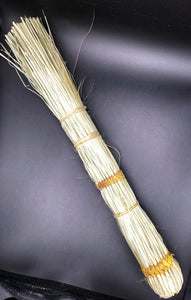 top view of one hand broom made from papyrus reed natural color