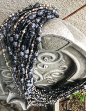 Load image into Gallery viewer, Hand crafted faded/weathered black paper bead and black and grey with gold accent bead necklace style made from magazines. Each bead individually rolled by hand.  Stylish and Fashionable for casual or dressy. Fair trade. 