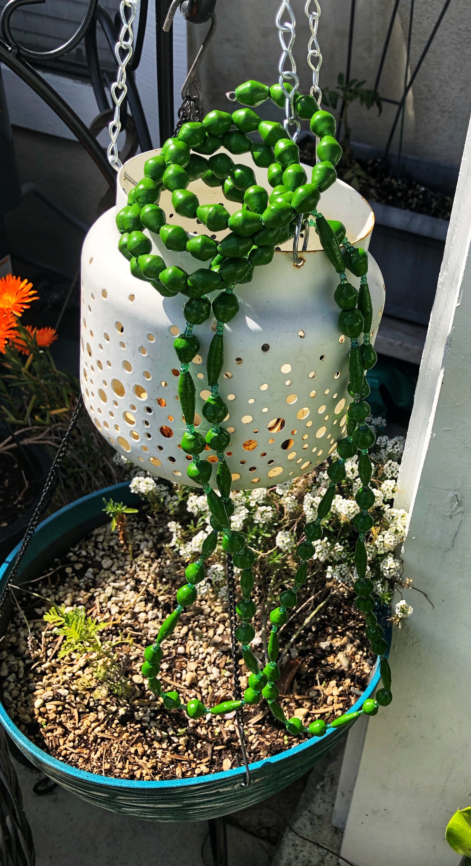 Long handmade paper bead necklace and memory wrap bracelet set green color. Necklace is approximately 30” long and usually worn doubled. Bracelet is a wrap bracelet. Handcrafted from magazines. Fair trade. Color: Green memory wrap bracelet and necklace pictured.