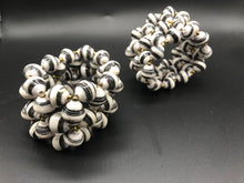 Load image into Gallery viewer, Hand crafted stretch bracelet made from magazines and each bead individually rolled by hand.  Special black and white paper bead stretch bracelet - Stylish and Fashionable for casual or dressy. Fair trade. 