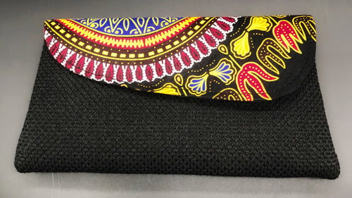 Black mini clutch purse canvas traditional African wax print pattern on flap in black multi color
